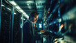 © GVS - Technician Analyzing Equipment in Data Center