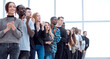 © ASDF - group of diverse young people applaud standing in a row