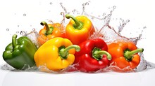  A Group Of Red, Yellow And Green Peppers Splashing Into A Body Of Water With A Splash Of Water Behind Them.