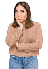 Sticker - Young beautiful woman wearing casual clothes thinking looking tired and bored with depression problems with crossed arms.