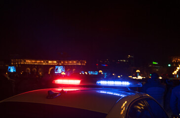 Sticker - Police car in the city in the evening