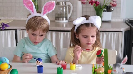 Wall Mural - Happy kids playing with easter eggs in kitchen