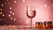 Summer drink. Glass of rose wine on pink background with copy space for text. Top view.