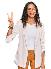 Sticker - Young african american girl wearing business clothes showing and pointing up with fingers number three while smiling confident and happy.