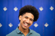 © mimagephotos - smiling young african american man