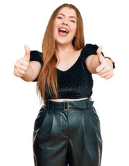 Poster - Young beautiful redhead woman wearing elegant clothes approving doing positive gesture with hand, thumbs up smiling and happy for success. winner gesture.