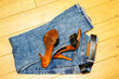 High heel open toe vintage style wooden mules on blue jeans, slip-on sexy wooden mules
