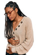 © Krakenimages.com - African american woman wearing casual clothes with hand on stomach because indigestion, painful illness feeling unwell. ache concept.