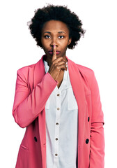 Poster - African american woman with afro hair wearing business jacket asking to be quiet with finger on lips. silence and secret concept.