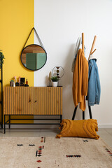 Sticker - Interior of stylish hallway with mirror, wooden cabinet and rack