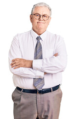 Poster - Senior grey-haired man wearing business clothes happy face smiling with crossed arms looking at the camera. positive person.