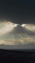 Wall Mural - timelapse with sunlight and moving sunbeams and mountain landscape. vertical video