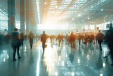 Fototapeta Przestrzenne - Silhouetted people walking in sunlit convention hall