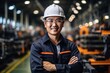 © duyina1990 - Portrait of a smiling Asian male engineer wearing a hard hat in a factory