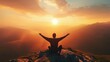 Silhouette of a person kneeling with open arms and looking at the sky on top of a mountain. Concept of religious and spiritual life. Warm atmosphere at dawn. Copy space