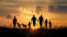 People In The Park. Silhouette Of A Big Happy Family On A Walk With A Dog At Sunset In A Field In Nature. Happy Family Kid Dream Lifestyle Concept. Big Friendly Family Walk At Sunset In The Park