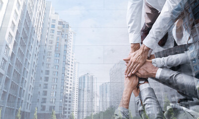 Wall Mural - Partnership, cooperation, collaboration. Double exposure of cityscape and people joining hands. Banner design