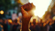 The power of protest is encapsulated in a raised fist, a resolute symbol of opposition and a call