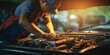Asian car mechanic repairing car engine in auto repair shop