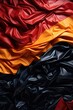 © duyina1990 - Red orange yellow black crumpled glossy fabric