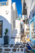 View of whitewashed cobbled street, Little Venice of Mykonos . Greek Island.
