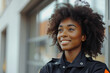 © Aris - Afro woman wearing Emergency Services Dispatcher uniform on duty