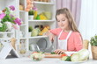 © aletia2011 - Portrait of young girl cooking in kitchen