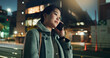 © N Felix/peopleimages.com - Asian woman, phone call and laughing at night in city for funny joke, conversation or outdoor travel. Happy female person smile and talking on mobile smartphone in late evening for discussion in town