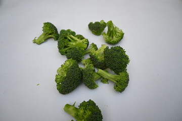 Broccoli Isolated on white background. Its other names Brassica oleracea var italica. This is an edible green plant in the cabbage family.  Broccoli is a particularly rich source of vitamin C and K.