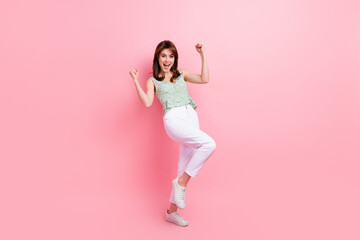 Canvas Print - Full length photo of cheerful positive nice girl wear fashionable clothes dance with raised hands isolated on pink color background