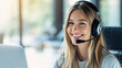 © johnalexandr - Smiling blonde girl with headphones and microphone on white background. Woman from the support service advises customers in call center.