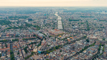 Amsterdam, Netherlands. Panorama Of The City In The Morning In Cloudy Weather. View Of The Amstel River With Locks, Aerial View