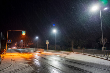 night traffic at night with snow