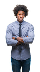 Afro american business man over isolated background skeptic and nervous, disapproving expression on face with crossed arms. Negative person.