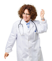 Poster - Middle ager senior doctor woman over isolated background Dancing happy and cheerful, smiling moving casual and confident listening to music