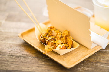 Wall Mural - Takoyaki and fried Dumplings Japanese snack in a white box.