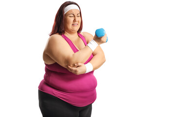 Canvas Print - Plus size woman in sportswear suffering from pain in the elbow