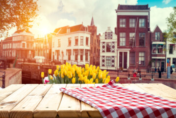 Wall Mural - Beautiful Dutch scenery with traditional windmills and tulip flowers foreground . High quality photo