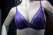 Closeup of purple bra on mannequin in a fashion store showroom