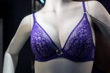 Fototapeta Sypialnia - Closeup of purple bra on mannequin in a fashion store showroom