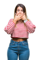 Poster - Young beautiful woman casual stripes winter sweater over isolated background shocked covering mouth with hands for mistake. Secret concept.