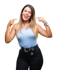 Poster - Young beautiful elegant business woman over isolated background smiling confident showing and pointing with fingers teeth and mouth. Health concept.