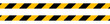 Distressed yellow and black barricade tape. Isolated element.