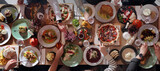 Fototapeta Kwiaty - Eating together. Table full of food, from above, wide view. Enjoying food, dining with family, friends.