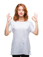 Sticker - Young beautiful woman over isolated background relax and smiling with eyes closed doing meditation gesture with fingers. Yoga concept.