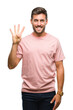 © Krakenimages.com - Young handsome man over isolated background showing and pointing up with fingers number four while smiling confident and happy.
