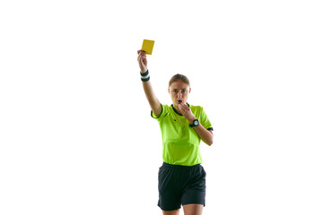 Wall Mural - Serious woman, soccer referee gesturing, raising hand, stopping game and showing yellow card as warning against white studio background. Concept of sport, competition, match, profession, football game