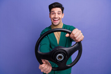 Canvas Print - Photo of excited glad man taxi driver wear stylish clothes ride new fast car isolated on purple color background