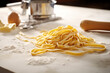 © ADDICTIVE STOCK - Generative AI image of raw, homemade tagliatelle pasta on a floured surface with eggs, a rolling pin, and pasta cutter in the background