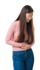 Wall Mural - Young Chinese woman over isolated background wearing glasses with hand on stomach because nausea, painful disease feeling unwell. Ache concept.